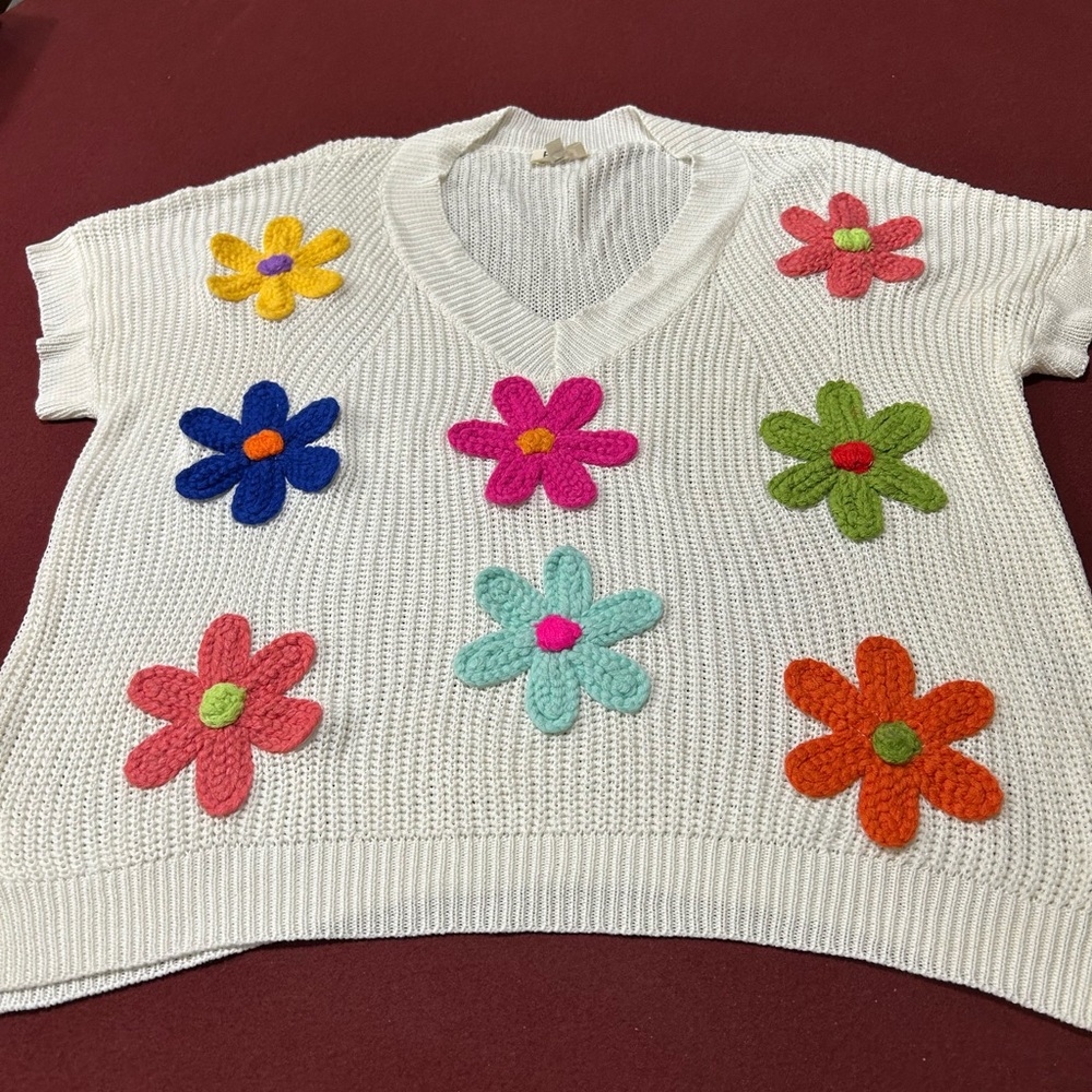 BiBi White V-Neck Sweater with Multicolor Floral Design